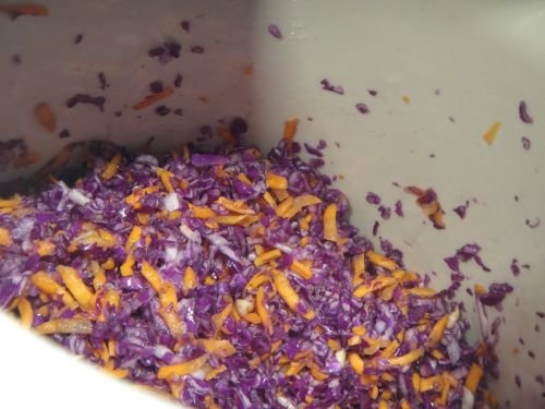 kimchi mixing and tamp in crock